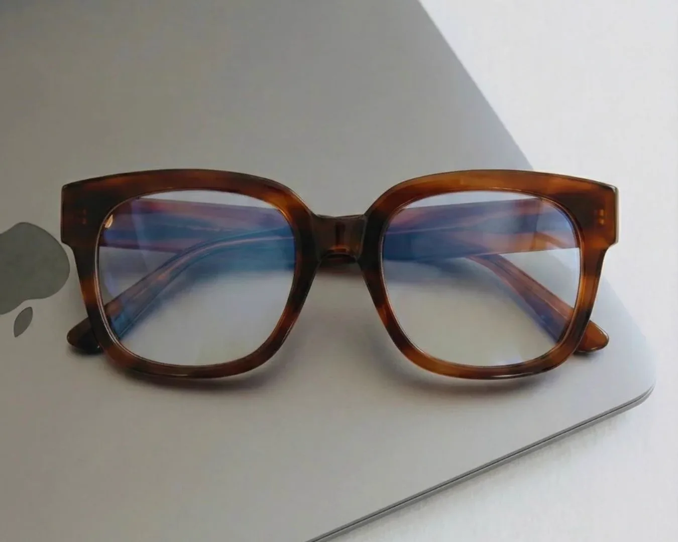 GLAS tortoise shell glasses on laptop